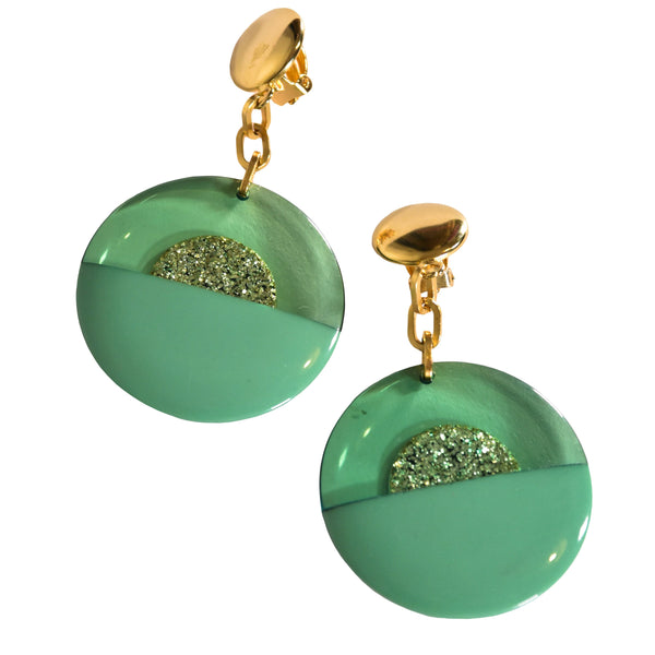 clip-on VINTAGE earrings from the 80's, resin circle shape green earrings, old stock gold tone metal earrings.