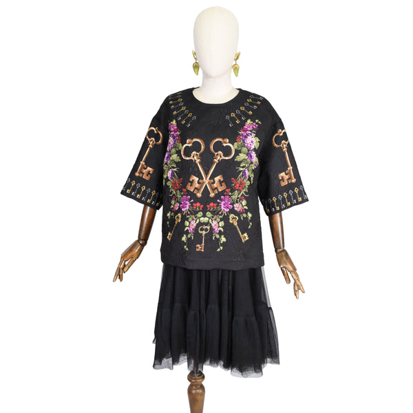 DOLCE GABBANA brocade top, printed with keys and multicolor flowers on black background, silk and polyester blend blouse