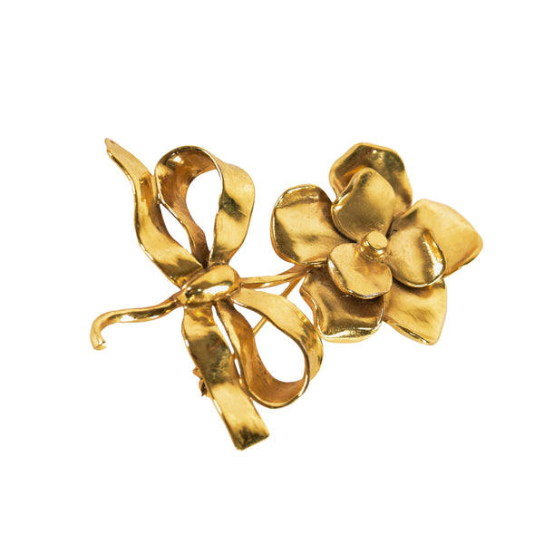 YSL vintage brooch. Yves Saint Laurent golden brooch. Brooch Saint Laurent of the 90s.