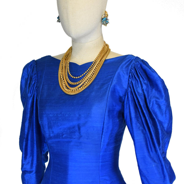 MOSCHINO 1990s necklace, multi-strand gold tone necklace with blue glass accent, MOSCHINO vintage 90s statement necklace.