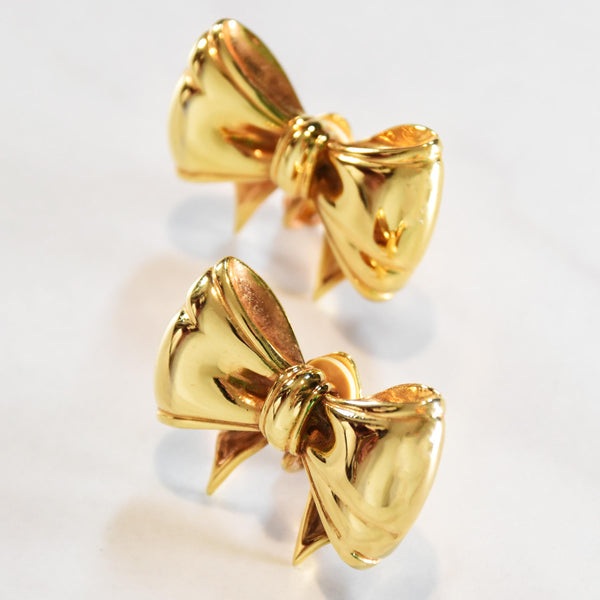 VALENTINO bow earrings, vintage gold tone luxury earrings, gold bow clip earrings, signed designer jewelry, retro gold bow statement earrings